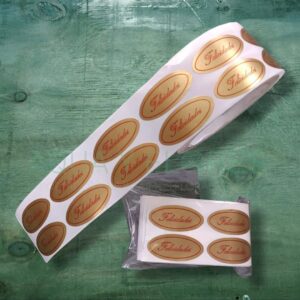 Adhesivo - Stickers  "Felicidades" Dorado Letras rojas 100 uds